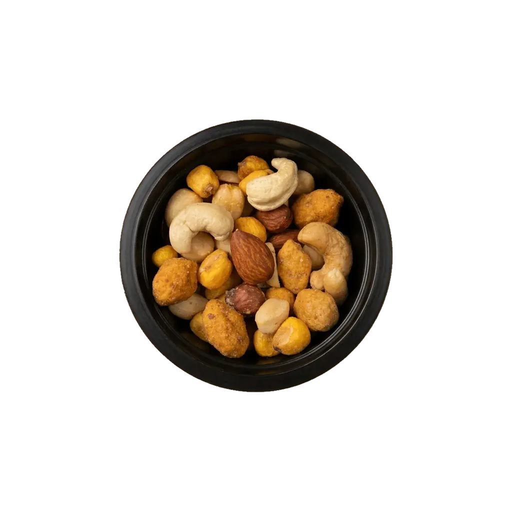 The Premium – Nuss-Mix mit Cashews, Mandeln und Krokant in der offenen Schale von oben